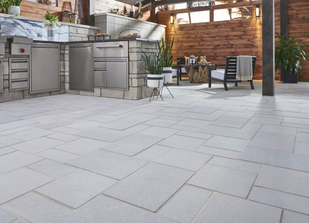 Large format paver brick patio with outdoor kitchen