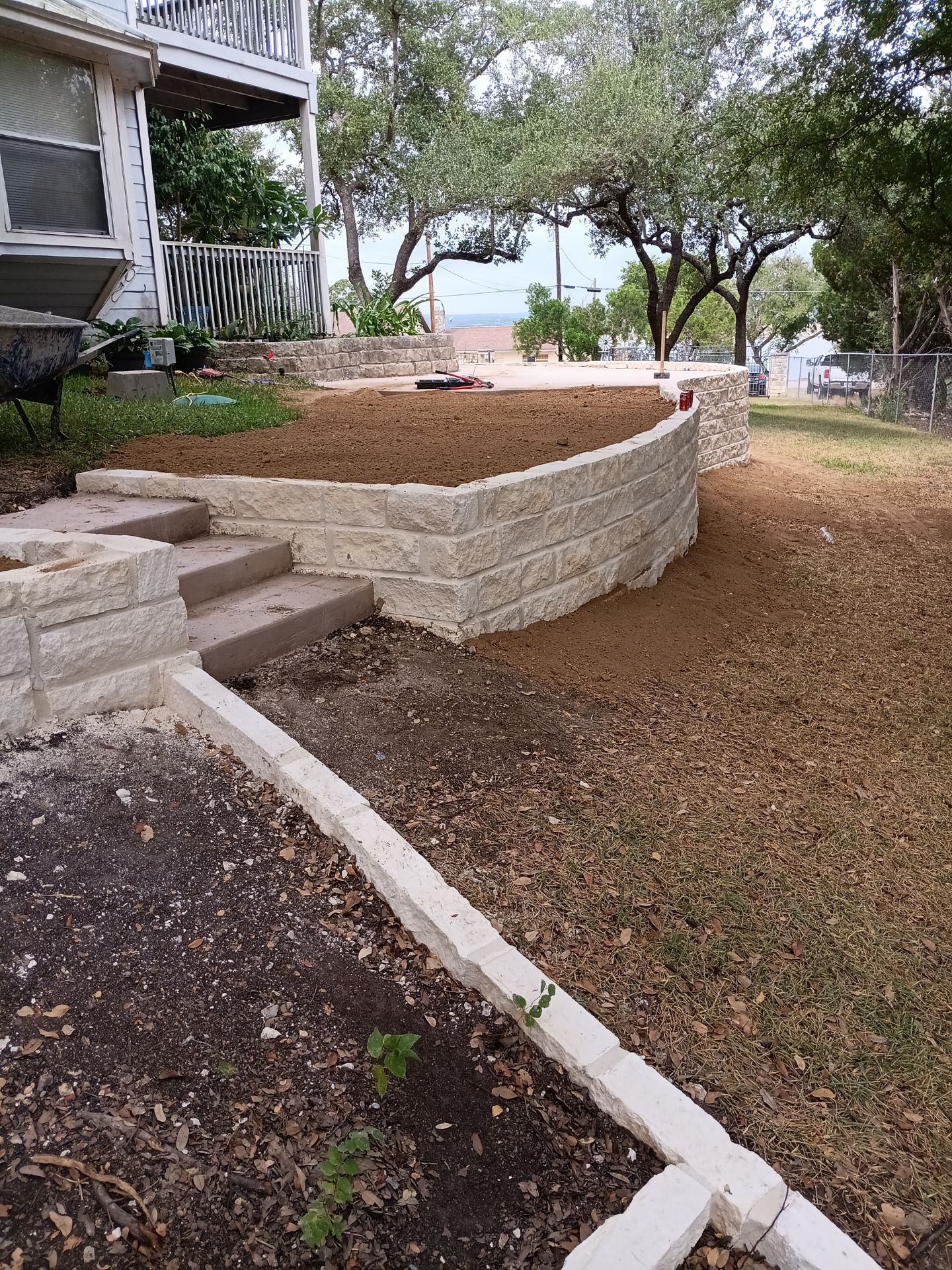 Tiered flower bed with stone steps
