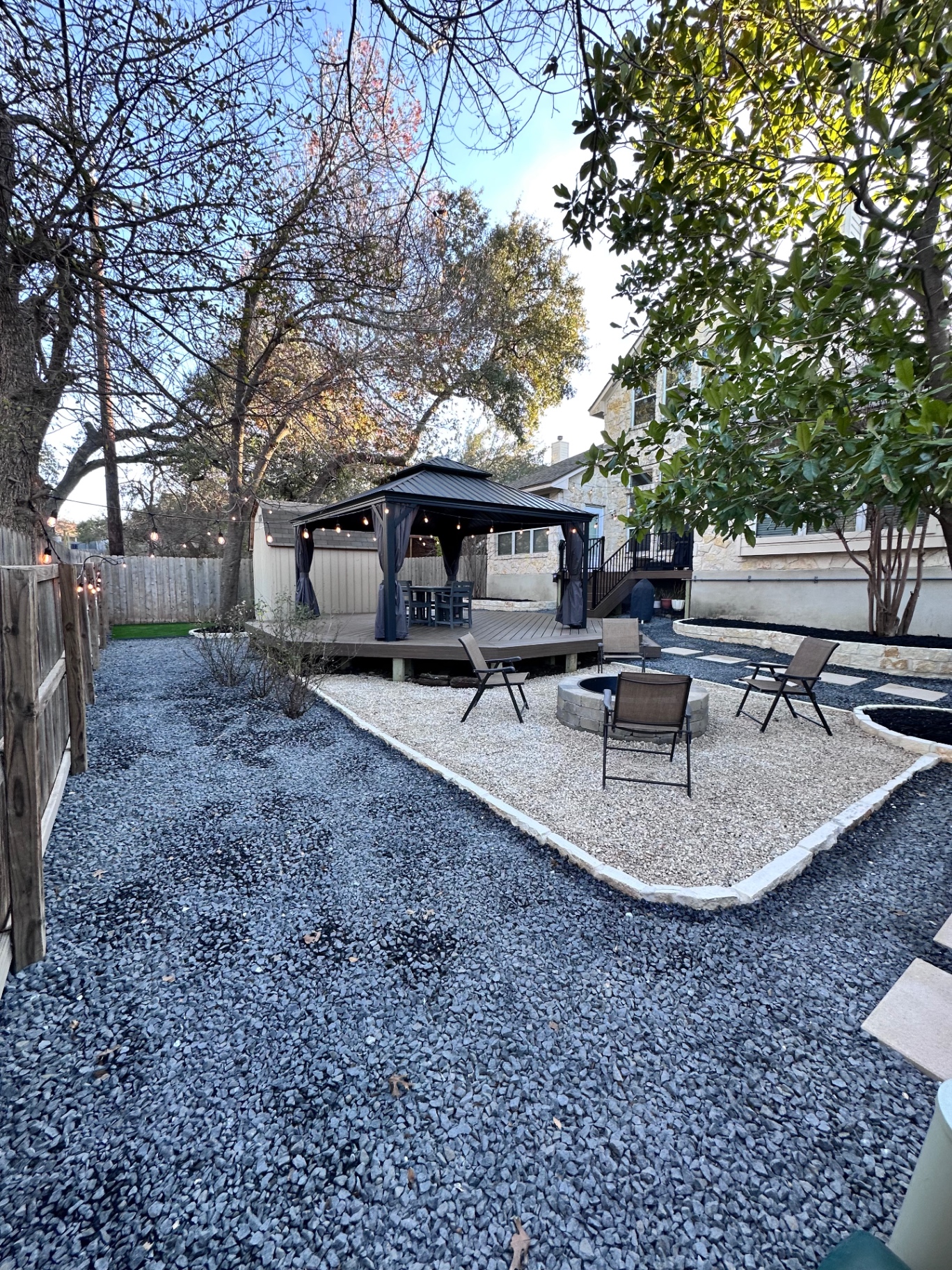 Drought-tolerant landscape with steel edging and ornamental grasses